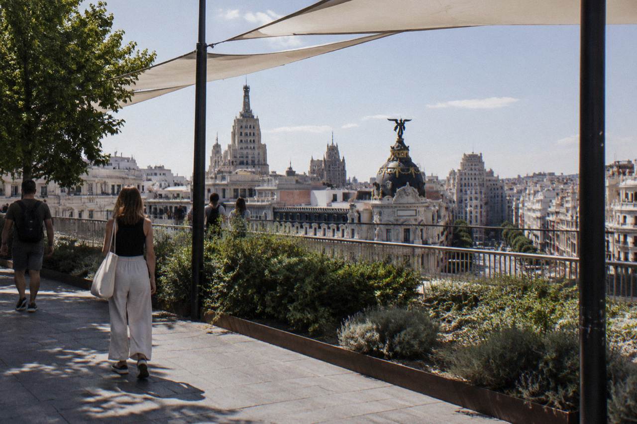 Rooftop terrace of the Círculo de Bellas Artes with the Bank of Spain building and Gran Vía skyline behind it
